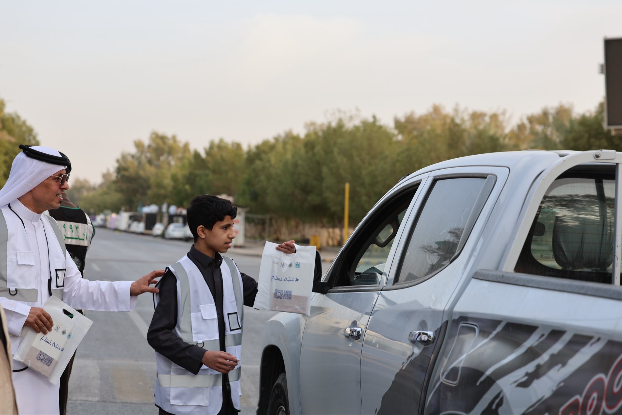 صورة من توزيعات في الميدان لحملة تنبه تسلم